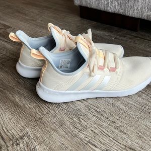 Adidas tennis shoes.